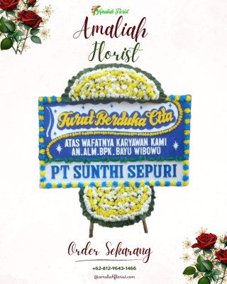 Papan Bunga Duka di Penengahan
